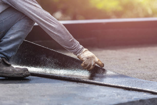 Professional Basement Waterproofing technician working in Columbia City, IN